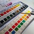 Image client Coffret aquarelle Van Gogh dans une boîte en métal ½ tasse (24 couleurs)