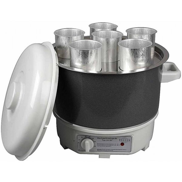 Le récipient chauffant pour verser les bougies Le récipient chauffant pour verser les bougies