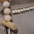 Image client Boules en bois non traité 25 mm ø 6 mm - paquet de 8. avec des trous