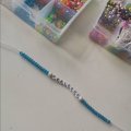 Image client Perles rocaille ø 5,5 mm - bleu clair 17 g doublé argent
