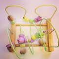 Image client Boules en bois non traité 40 mm ø 8 mm - paquet de 3. avec des trous