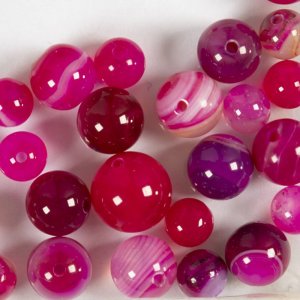 Perles d'agate rose 10x10-15x6 mm - 28 pièces. Perles d'agate rose 10x10-15x6 mm - 28 pièces.