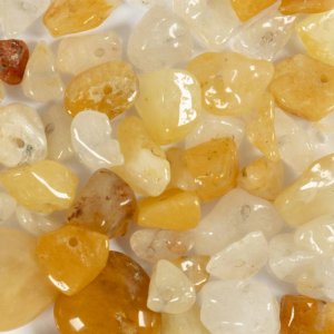 Perles de cristal couleur miel calcite jaune clair 7-12 mm - 63 pièces. Perles de cristal couleur miel calcite jaune clair 7-12 mm - 63 pièces.