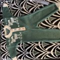 Image client Fil DROPS Merino Extra Fine Uni Color - 50g - Vert forêt (31)