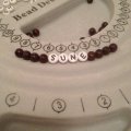 Image client Perles en bois 6 mm - marron paquet de 110 diamètre trou 2,0 mm